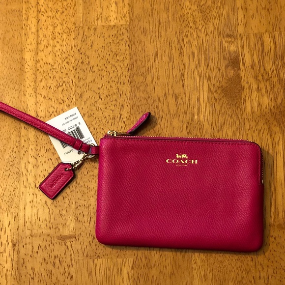 Coach Handbags - NWT Pink Coach wristlet